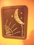 chalkboard sketch of sun and moon