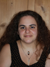 white woman with medium length brown hair background is pine door