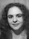 black and white photo of white woman with long wavy